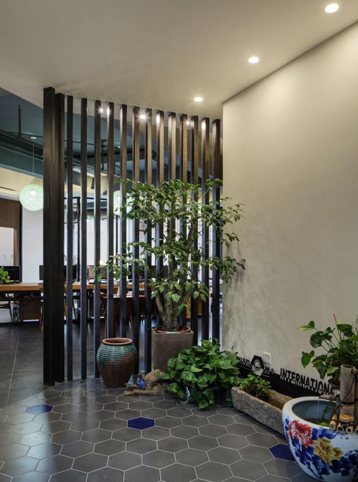 進(jìn)出口貿(mào)易公司辦公室進(jìn)門區(qū)裝修設(shè)計效果圖