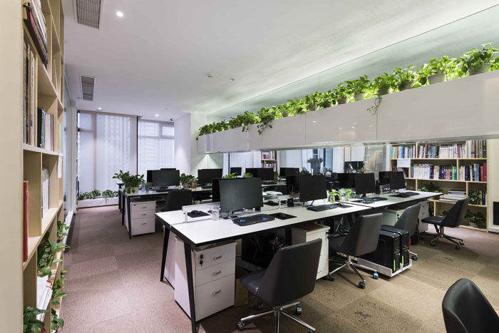 設計公司辦公室辦公區(qū)裝修設計效果圖